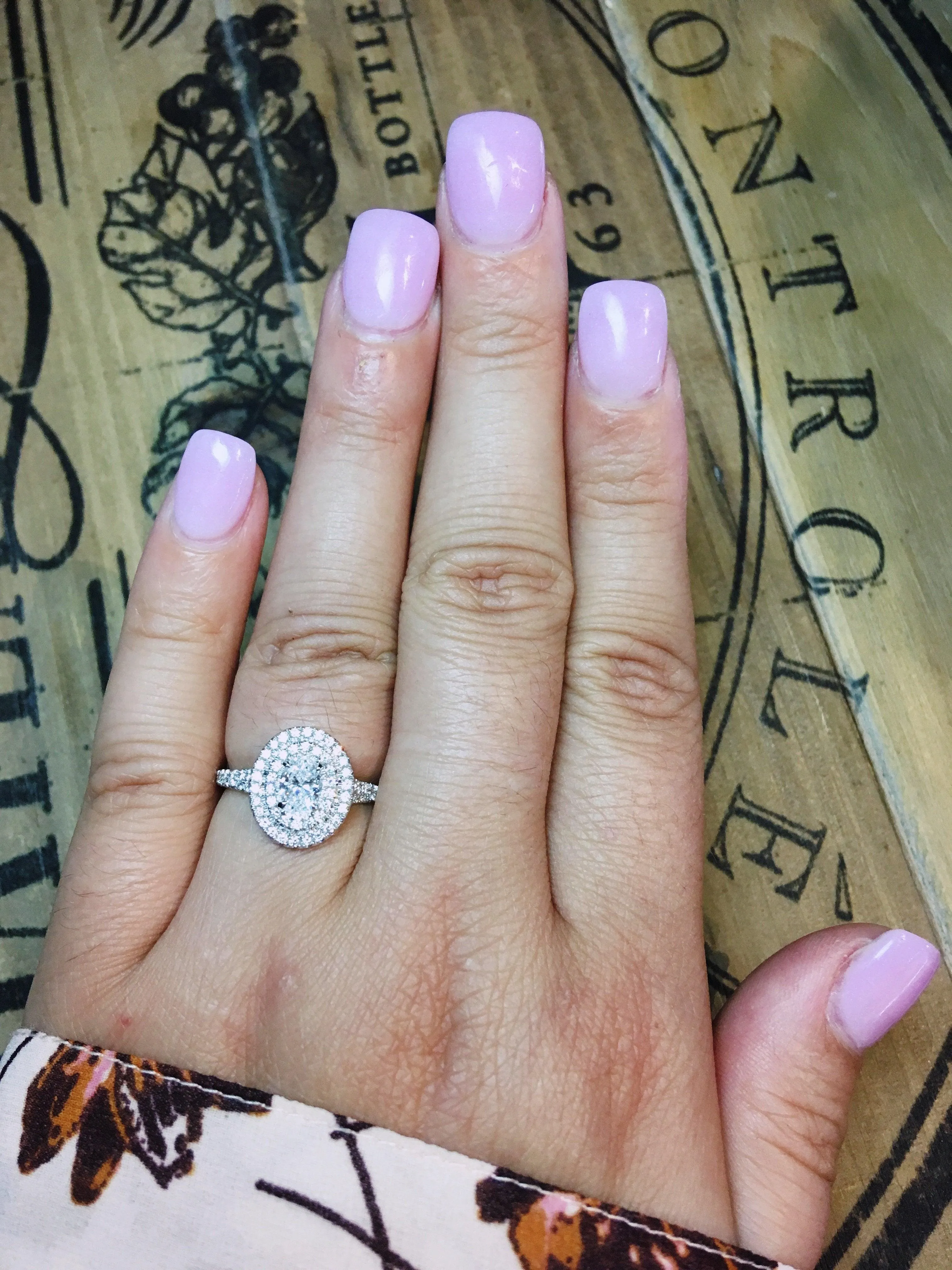 Love Story Oval Halo Engagement Ring