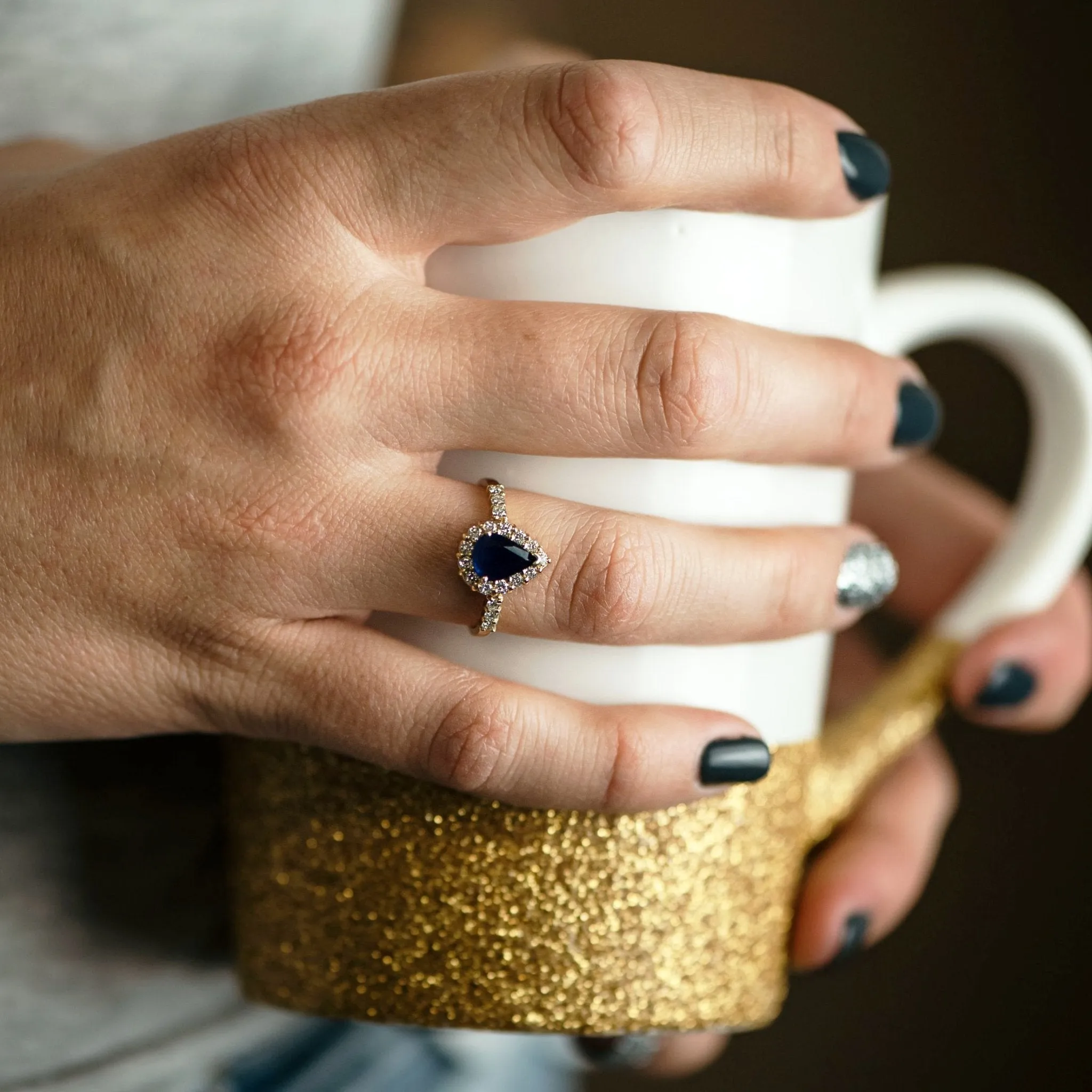 Pear-Shaped Blue Sapphire and Diamond Halo Ring