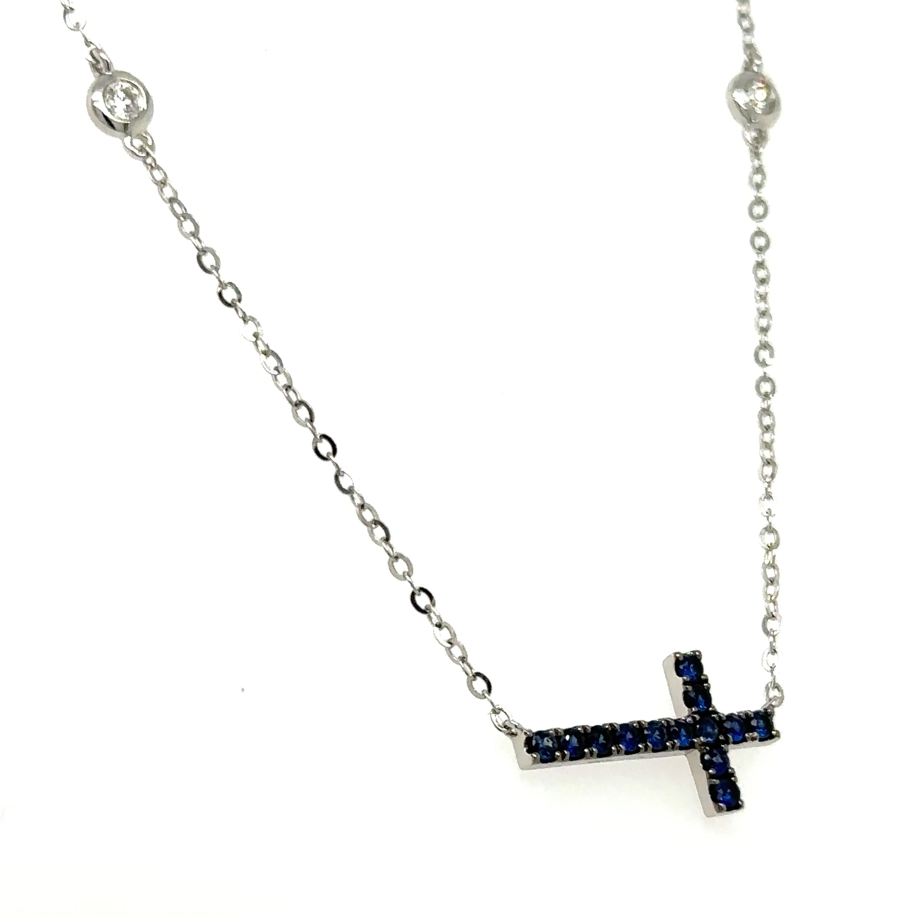 Royal Blue Sapphire and Diamond Sideways Cross Pendant Necklace