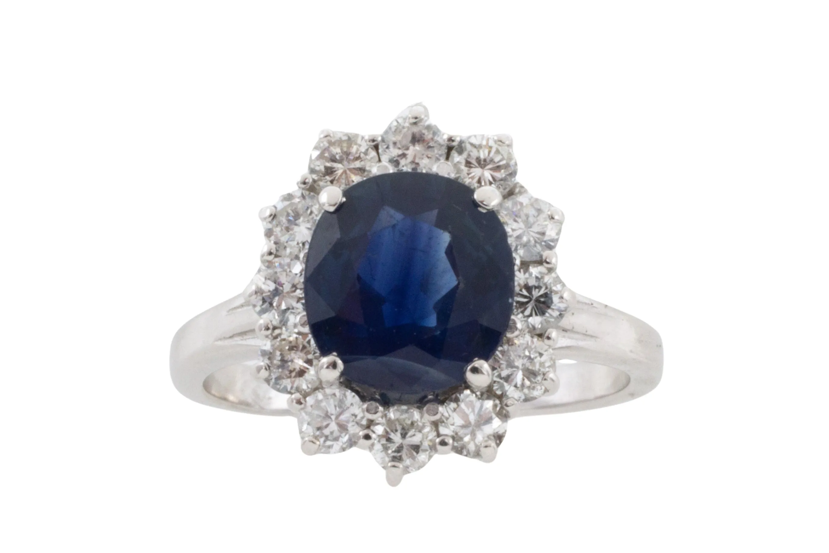Sapphire and diamond cluster ring in white gold